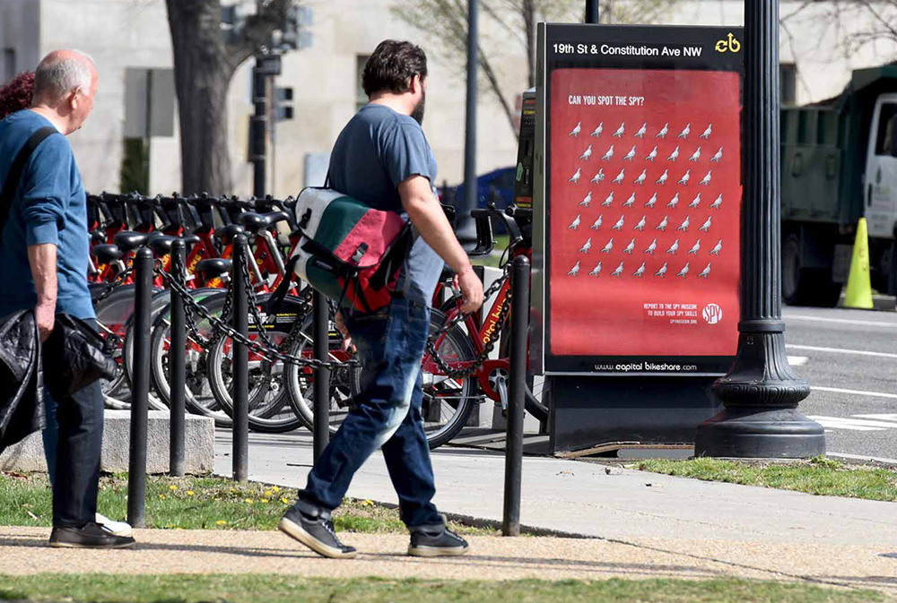 Basket and rear-wheel panel advertising on bike share fleet