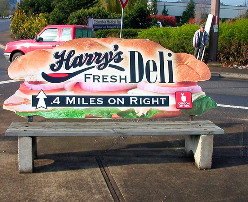 Transit Advertising at Bench for Harry's Deli Fresh, 4 Miles on Right