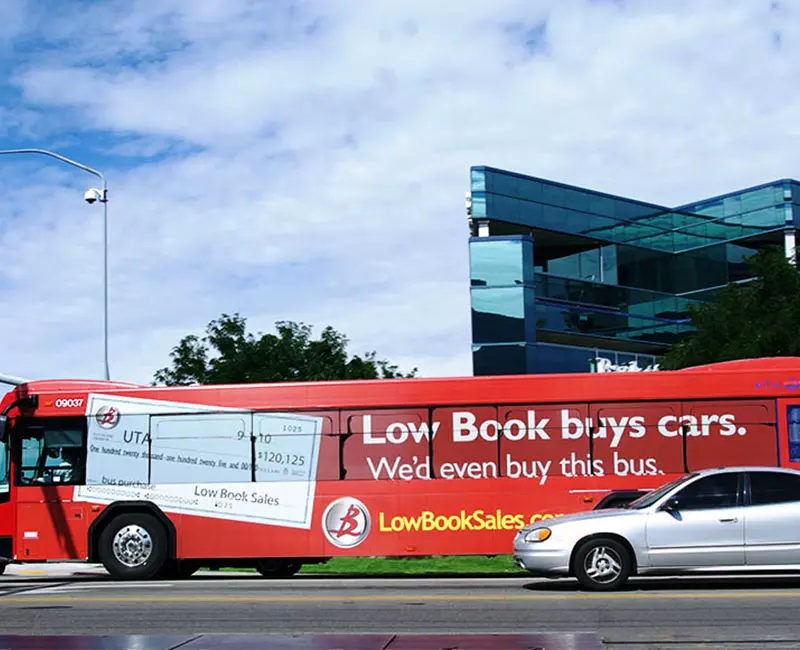 Bus Advertising, Low Book buys cars, We'd even buy this bus, LowBookSales